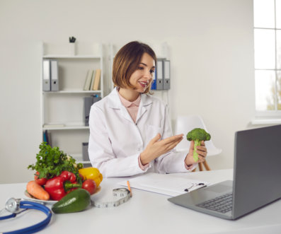 woman holding vegetable