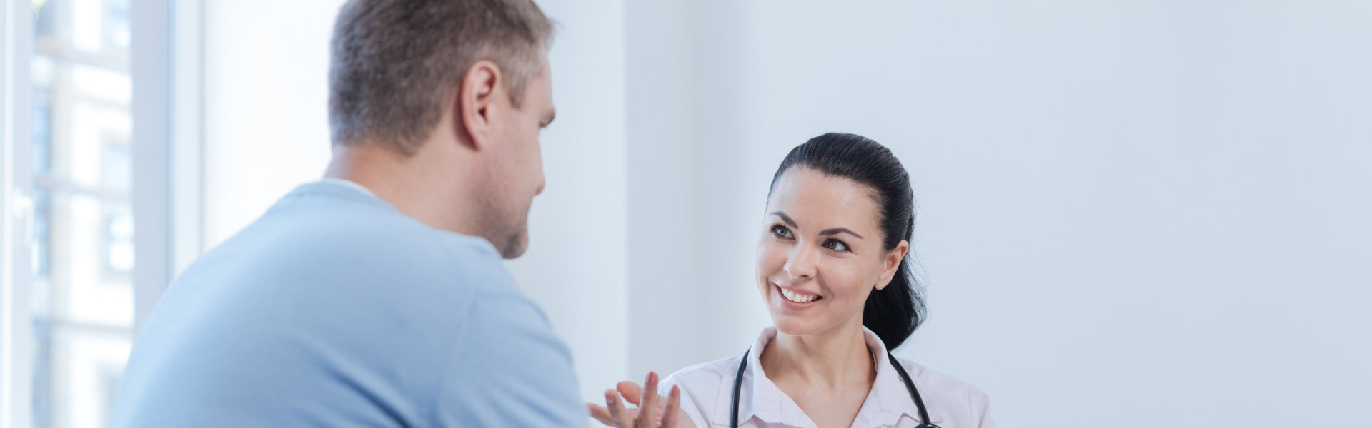 staff and the patient talking