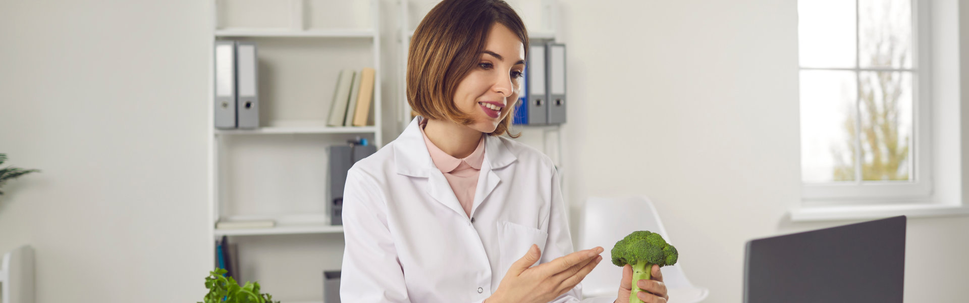 woman holding vegetable